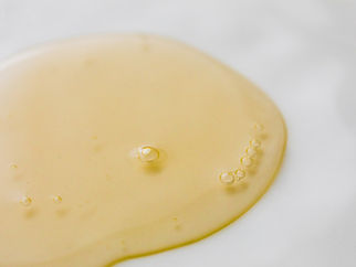When should you remove abdominal fluid for cats with Wet FIP.